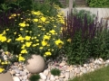 12 planting design and stone globe light